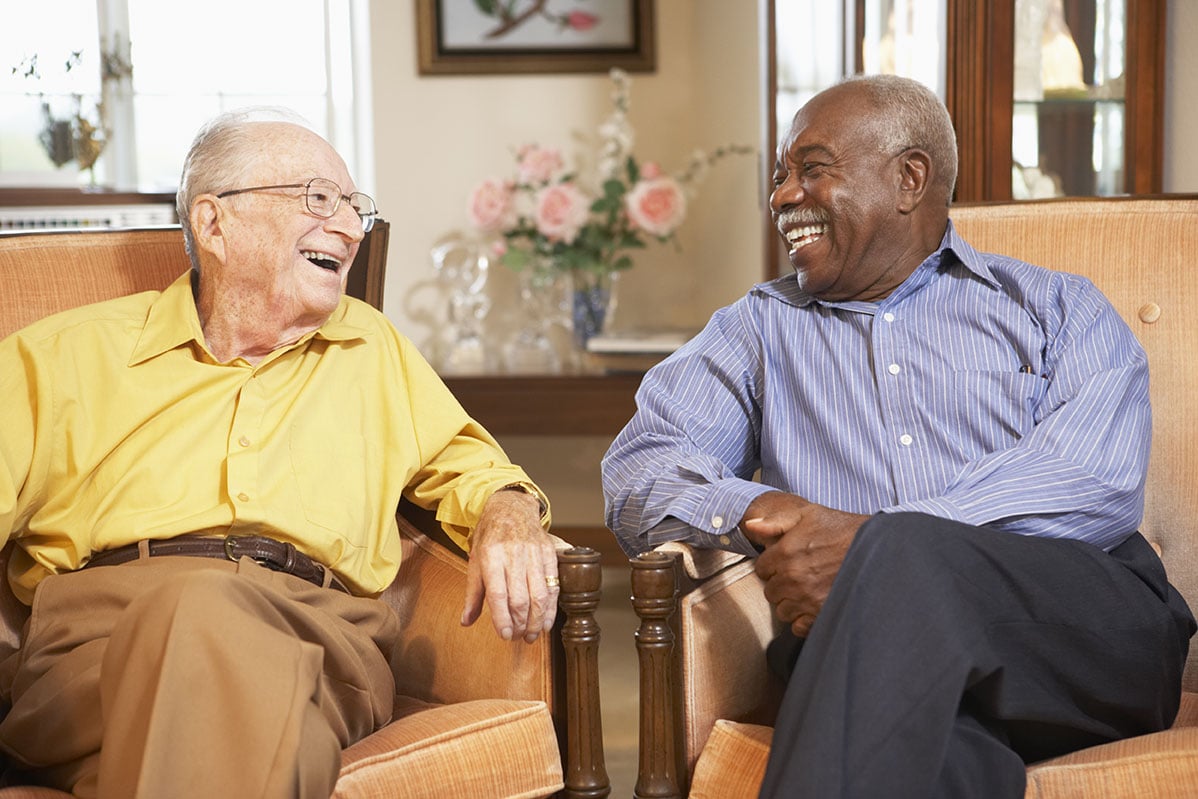 Residents laughing together at Magnolia Heights